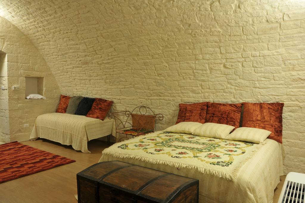 Palazzo Agrusti - Residenza D'Epoca Bed and Breakfast Alberobello Rum bild