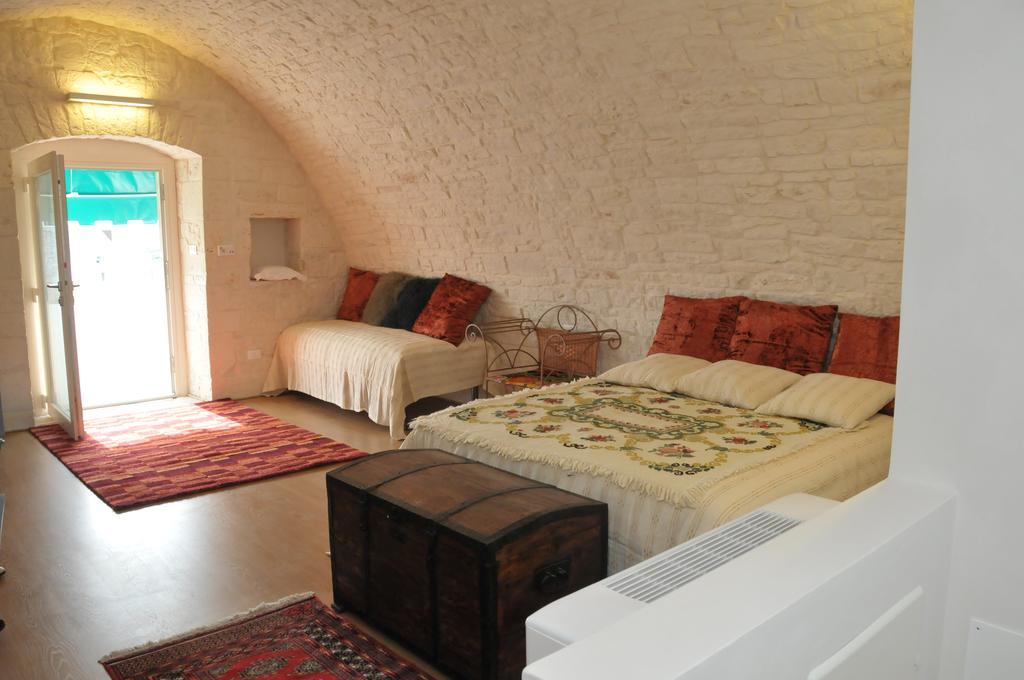 Palazzo Agrusti - Residenza D'Epoca Bed and Breakfast Alberobello Rum bild